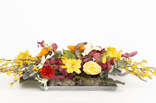 Centre de table en fleur artificielle idéal pour les tables ou les buffets. Les teintes orange et jaune