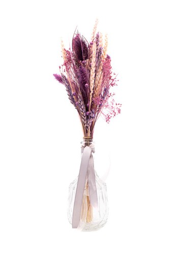 Vase en verre féminin avec fleurs séchées aux couleurs crème et rose